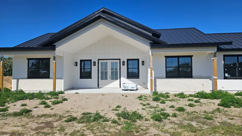 Modern Barnhome custom home by Studio AM in Groveland, Florida